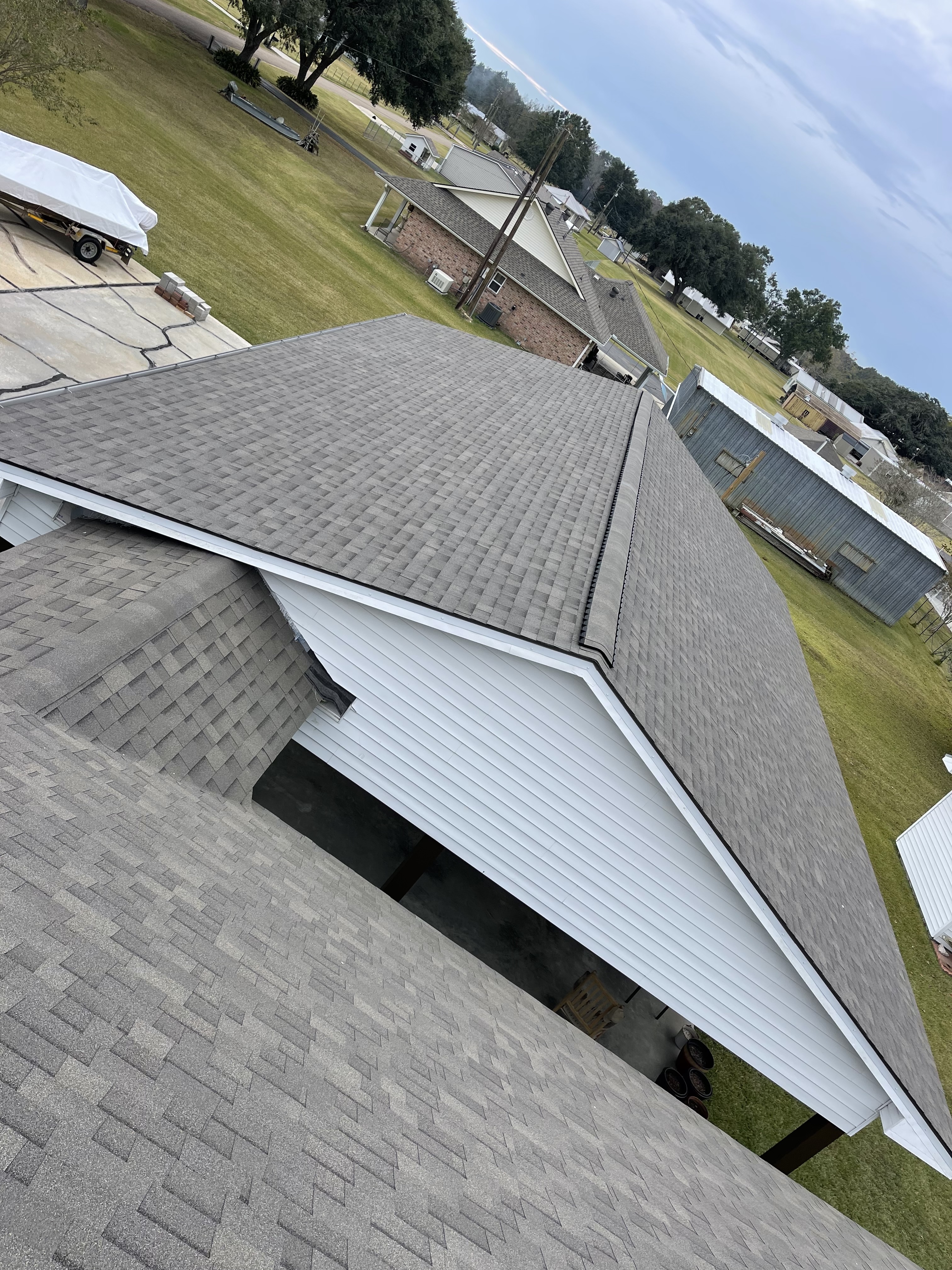 Metal to Shingle Roof Replacement on Attached Garage in Gonzales